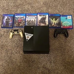 PS4 W/ two controllers and 6 games (fully working)